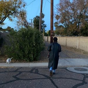 black genuine leather trench coat